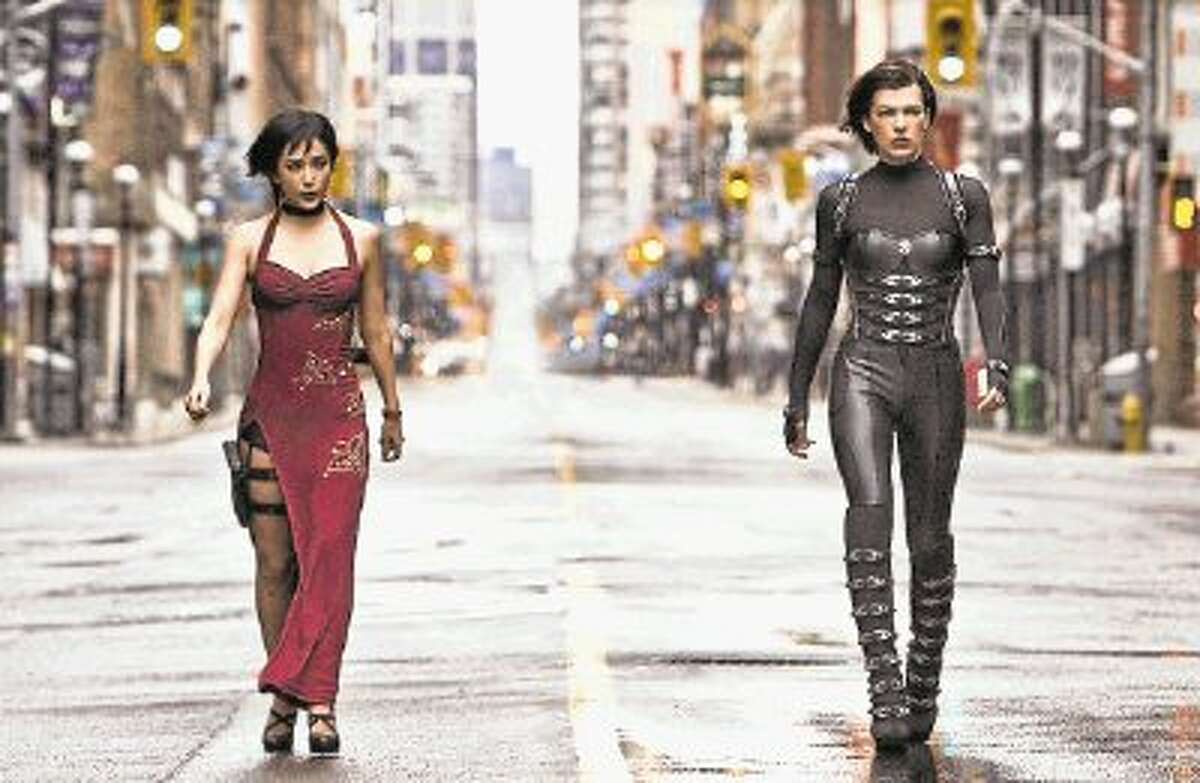 Milla Jovovich, right, stars as Alice in “Resident Evil: Retribution,” the fifth movie in the zombie series created by her director husband Paul W.S. Anderson.