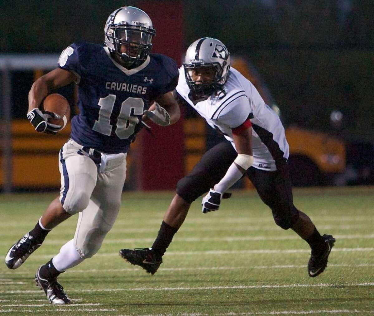 College Park’s Nicholas Black gets by a Clear Brook defender during Thursday night’s game at Woodforest Bank Stadium in Shenandoah.