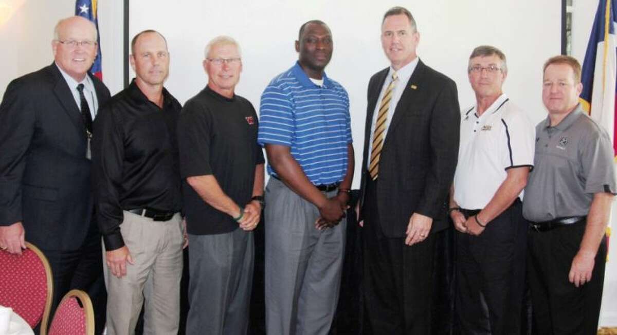 Conroe ISD head football coaches spoke at The Woodlands Rotary Club on Sept. 5 at The Woodlands Conference Center and Resort. Brent Verzwyvelt (Caney Creek), Robert Walker (Conroe), Dereck Rush (Oak Ridge), Mark Schmid (The Woodlands) and Richard Carson (College Park) spoke on behalf of their players and coaches. All five coaches displayed their excitement for the season, but moreso, pride in their players. “Many like to point out the negatives in schools, but everyday positive things take place in schools; and you can see some of these positives at football games — from the band, drill team, cheerleaders, football players, and all involved,” Carson said. The coaches speak yearly at Lions Clubs and Rotary Clubs at the beginning of the season, and this was their final speaking engagement.