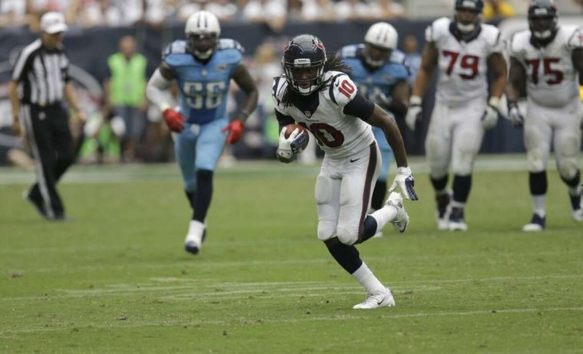 Houston Texans wide receiver DeAndre Hopkins turns upfield after catching a pass against the Tennessee Titans.