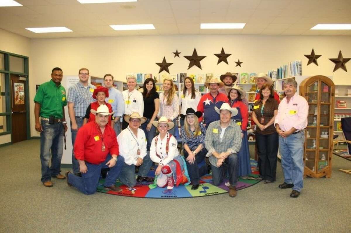 Houston Livestock Show and Rodeo committee volunteers educated and entertained students at WISD’s Meador Elementary Friday. Meador scholars learned about Texas music and history, ranching, cattle drives, livestock, Texas towns, rodeo clowns and dancing.