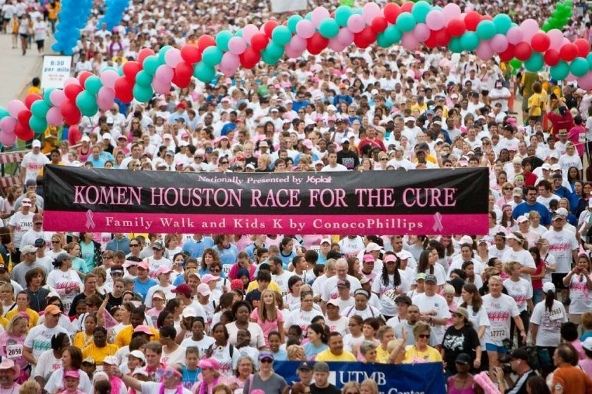 Thousands pack Allen Parkway in downtown Houston to take part in the Susan G. Komen “Race for the Cure” in 2009.