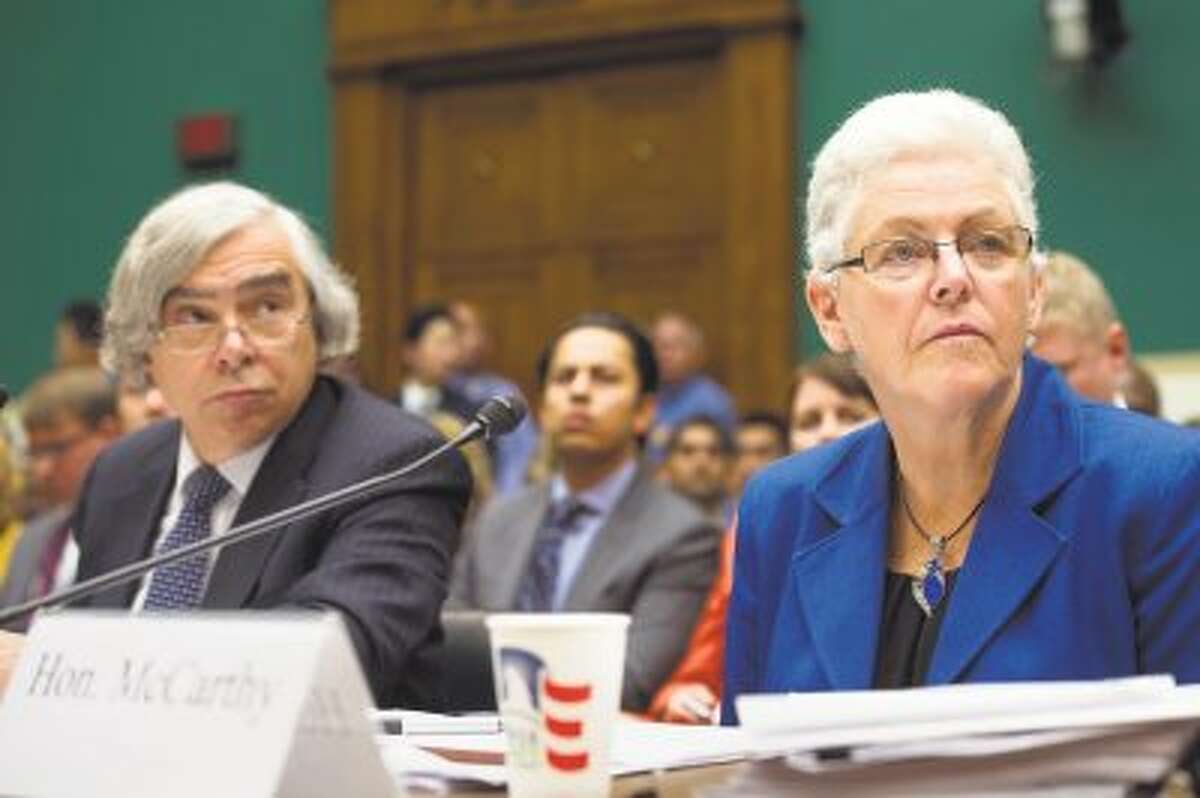 EPA Administrator Gina McCarthy, right, and Energy Secretary Ernest Moniz testify before the House Subcommittee on Energy and Power on Capitol Hill, in Washington, Wednesday, Sept. 18, 2013. The energy panel meeting Wednesday comes just days before a deadline for the Environmental Protection Agency to release a revised proposal setting the first-ever limits on carbon dioxide from newly built power plants.