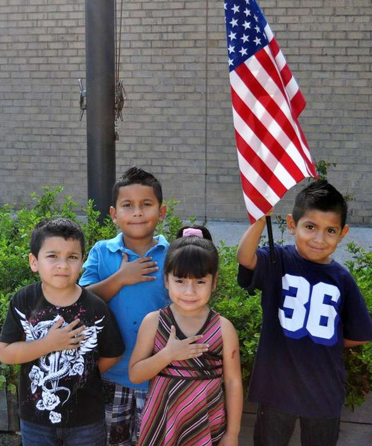 Creighton Kindergarten students have been studying the American Flag and learning the Pledge of Allegiance. Pictured are (left to right) Alexis Garcia, Rigoberto Macis, Valeria Andrade, and Andres Quintero.