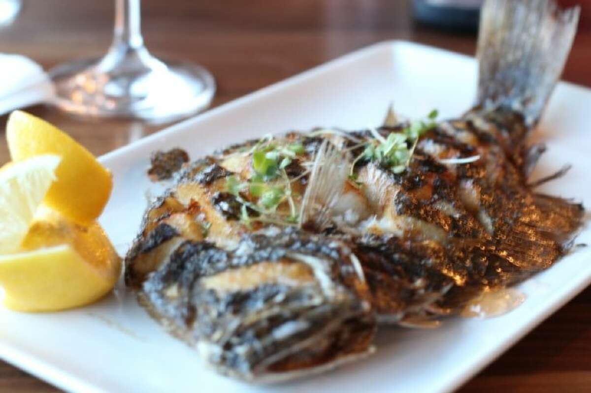One of Tanji’s favorite dishes, so far, at Eleven XI is the Apricot Flounder. The beautiful whole fish is lightly crisped and served with the most delicious apricot glaze.
