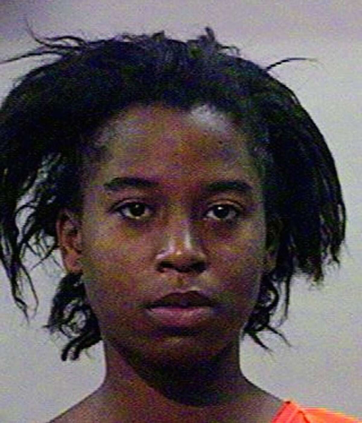 This file photo provided Tuesday by the Brazoria County Sheriff’s Office shows Kristi-An Walker. Angleton police say Walker, who is pregnant with her fourth child, has been charged in the deaths of her two infant sons. Walker remained jailed Tuesday on murder and two other charges relating to the deaths, which occurred in April 2011 and June.