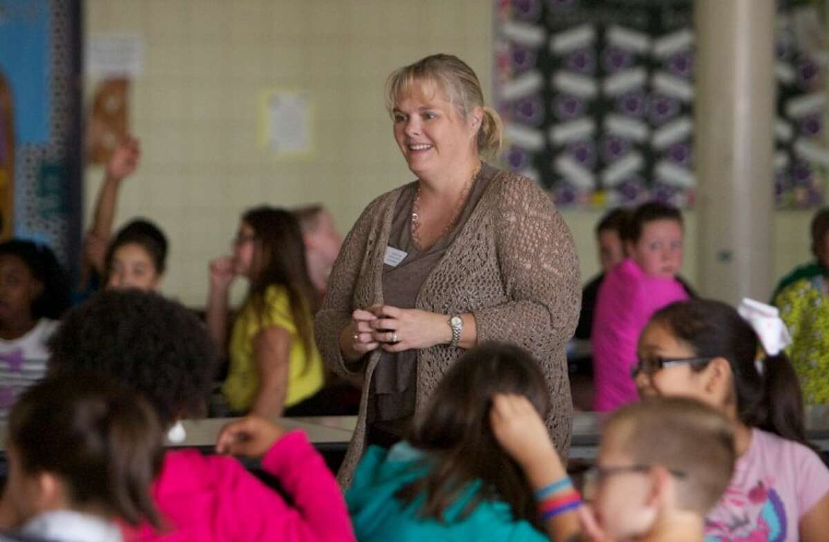 Former NASA employee Dr. Lisa Brown, speaks to Willis ISD students during Saturday's Science Symposium at Hardy Elementary School in Willis.