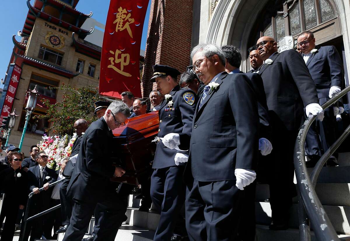 FILE-- Mayor Ed Lee accompanies Rose Pak's casket to a hearse with other dignitaries after funeral services for the Chinatown community leader at Old Saint Mary's Cathedral in San Francisco, Calif. on Saturday, Sept. 24, 2016.