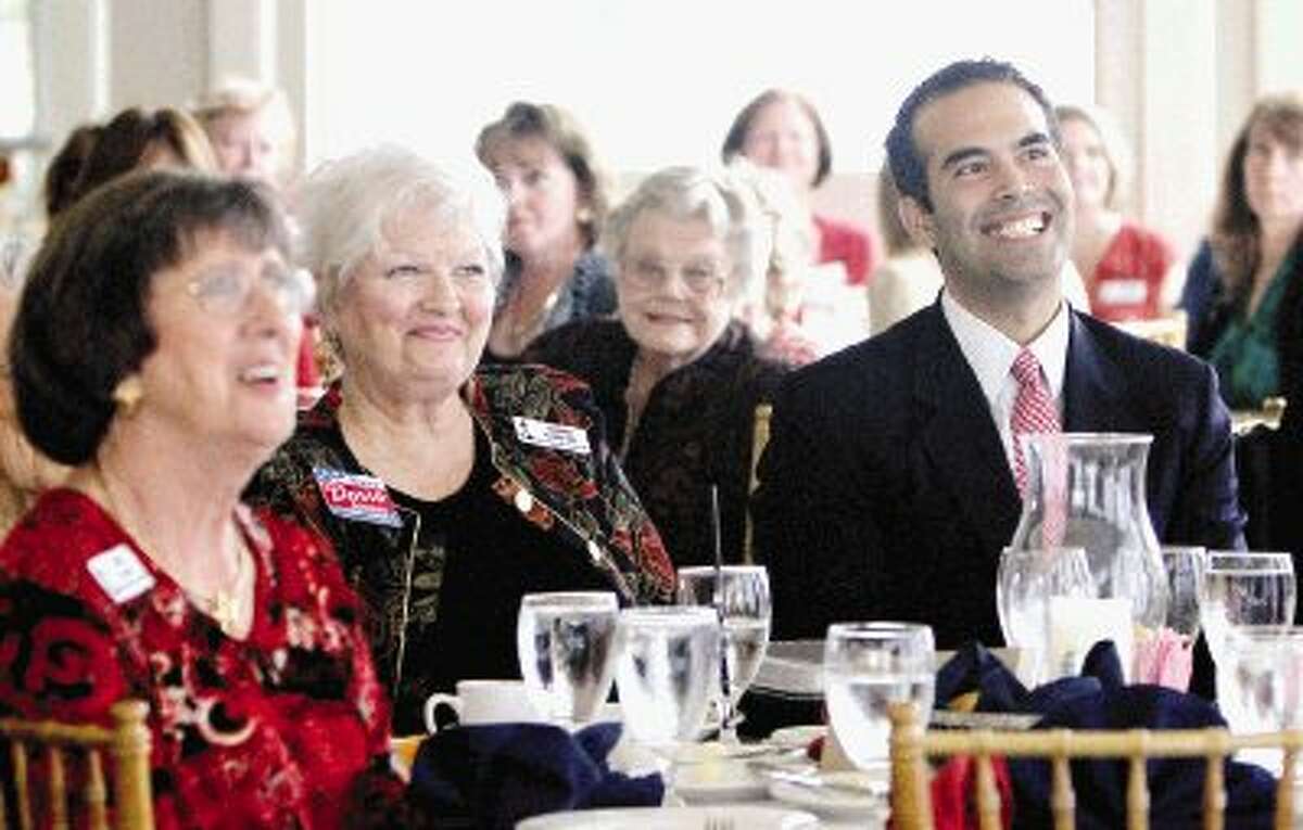 George P. Bush, nephew of former President George W. Bush, laughs at a joke after speaking at the North Shore Republican Women’s meeting at Bentwater Yacht Club Wednesday. Bush is a candidate for Texas general land commissioner in 2014. Go to HCNPics.com to view more photos from Bush’s visit.