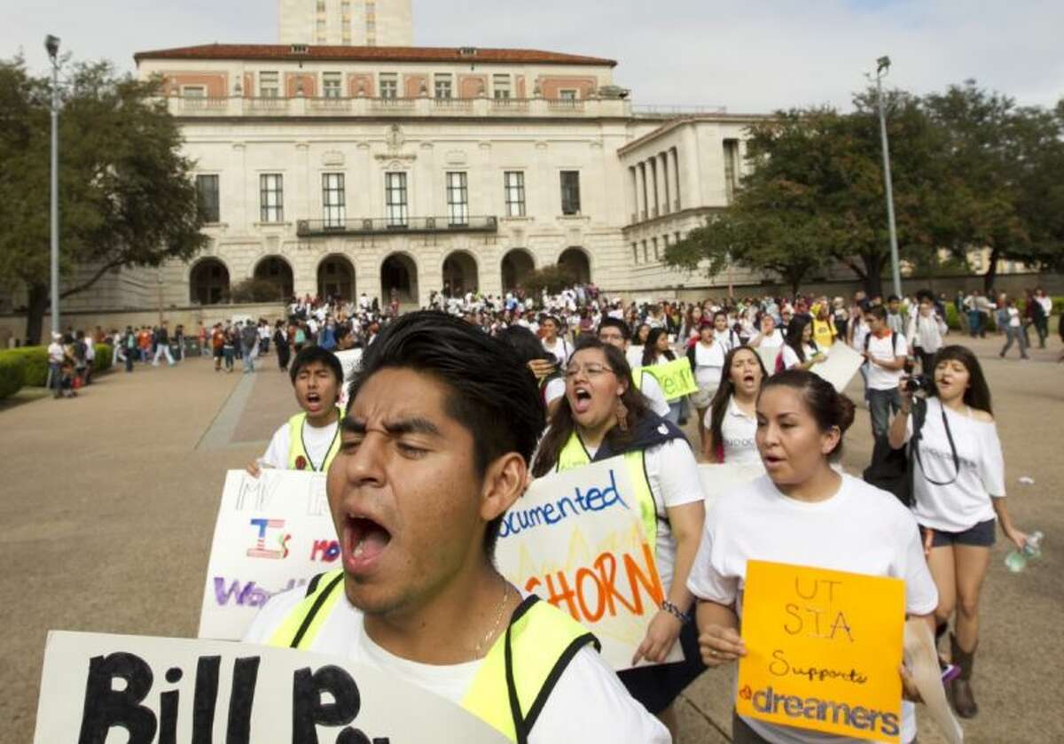 University of Texas student Jonathan Hernandez, 21, marches in an immigration rights rally on the University of Texas campus in Austin Wednesday.