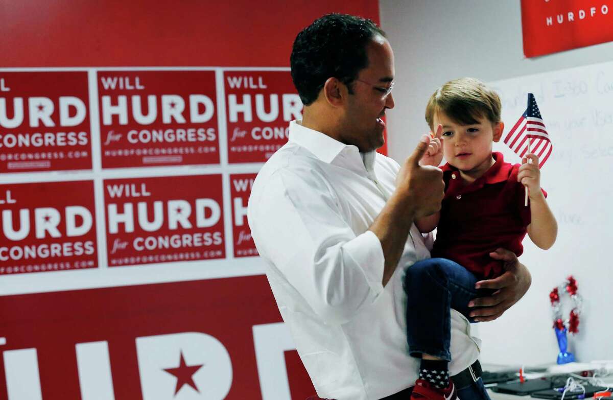 U.S. Representative Will Hurd (R, TX-23) holds the son of a supporter, four-year-old Ben Coons, as the Congressman rallies supporters at his campaign headquarters on Saturday, Sept. 24, 2016. The Republican Party in the Virgin Islands, a territory where residents can?’t vote for president or send voting members to Congress, is raising millions of dollars by direct mail primarily from senior citizens with appeals promising support for U.S. Rep. Will Hurd and two other African-American members of Congress ?– and opposition to Hillary Clinton. But only about 20 percent of those contributions make their way into political campaigns in the form of independent expenditures, with the rest going to pay political consultants, postage and fundraising costs, an analysis of campaign finance reports shows. Campaign legal experts describe the operation as part of the growing trend of ?“scam PACs,?” largely unregulated political entities that put little of their receipts back into campaigns. The Virgin Islands group and their Washington consultants focus heavily on seniors. In August, 190 of 284 contributors who listed employment identified themselves as retired, the group?’s latest report to the Federal Election Commission shows. Their appeals confuse seniors; the party goes by VIGOP, which an 83-year-old San Antonio contributor believed meant for Victory GOP. He says he wouldn?’t have donated had he known it stood for Virgin Islands. ?“The only thing I know about the Virgin Islands is that it?’s where Tim Duncan is from,?” said the San Antonian, Stanton Bell. Critics advise donors to deploy caution. Often they are victims, the critics say, as are the candidates whose names are being used and legitimate fundraising operations who have a smaller pool of money to draw from where scam PACS operate. (Kin Man Hui/San Antonio Express-News)