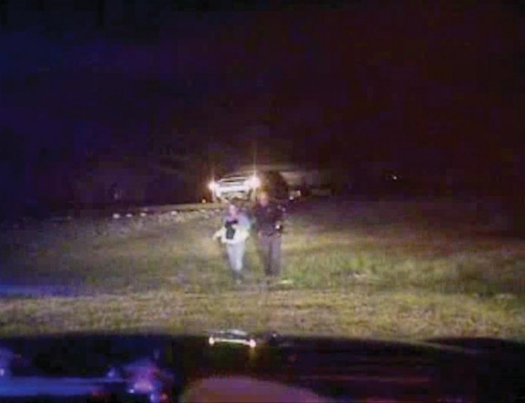 Woman pulled to safety minutes before train hits car