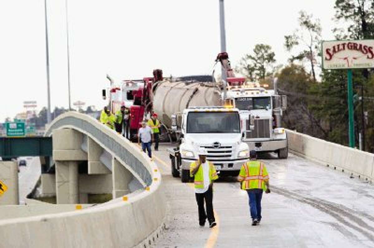 Hazmat crews with the Texas Department of Transportation worked through Saturday afternoon cleaning up the mineral baryte from the Interstate 45 North exit at Wilson Road.