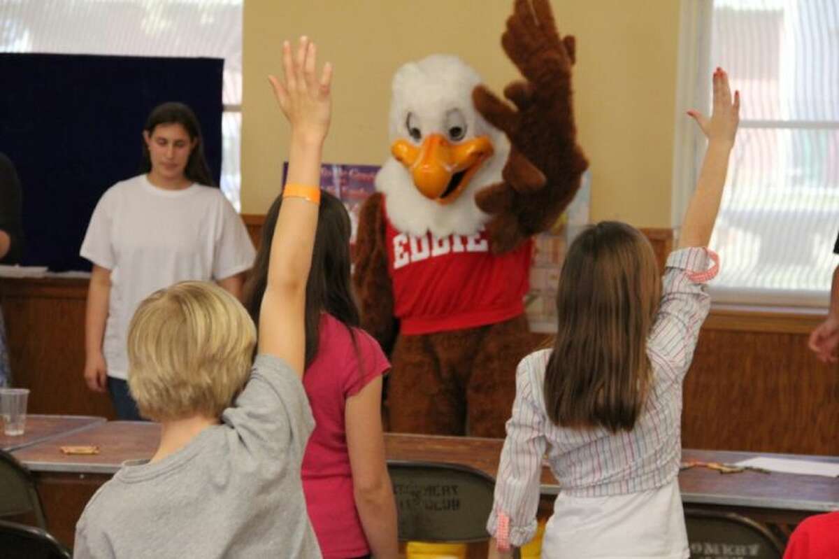 Mascot Eddie Eagle looks for volunteers to join him in reciting the rules to follow when a child sees a gun - “Stop! Don’t touch. Leave the area. Tell an adult.” The Montgomery Junior Shooters club hosted the Eddie Eagle GunSafe program Sunday afternoon at the Montgomery Community Center.
