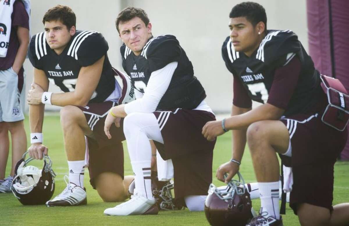 Texas A&M quarterback Johnny Manziel is suspended for the first half of today’s game against Rice and will be replaced by either Matt Joekel, left, or Kenny Hill in the starting lineup.