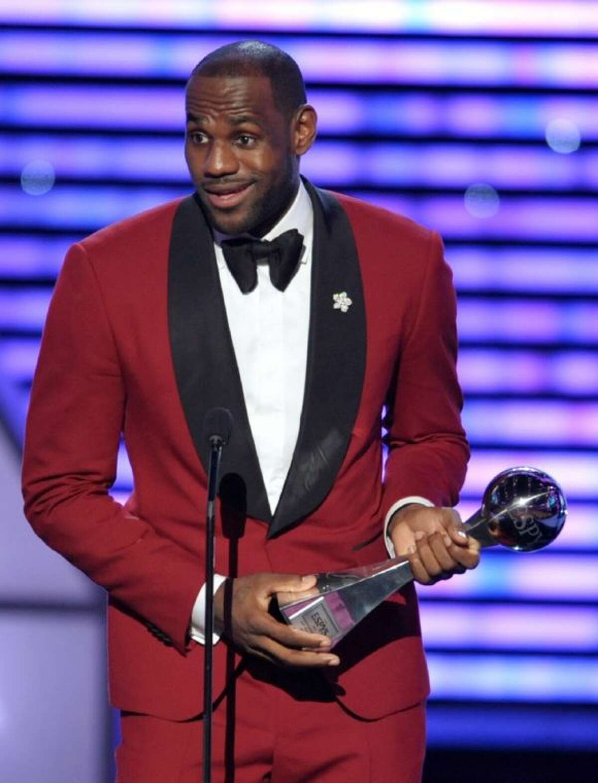 LeBron James accepts the trophy for best male athlete at the ESPY Awards on Wednesday at the Nokia Theater in Los Angeles.