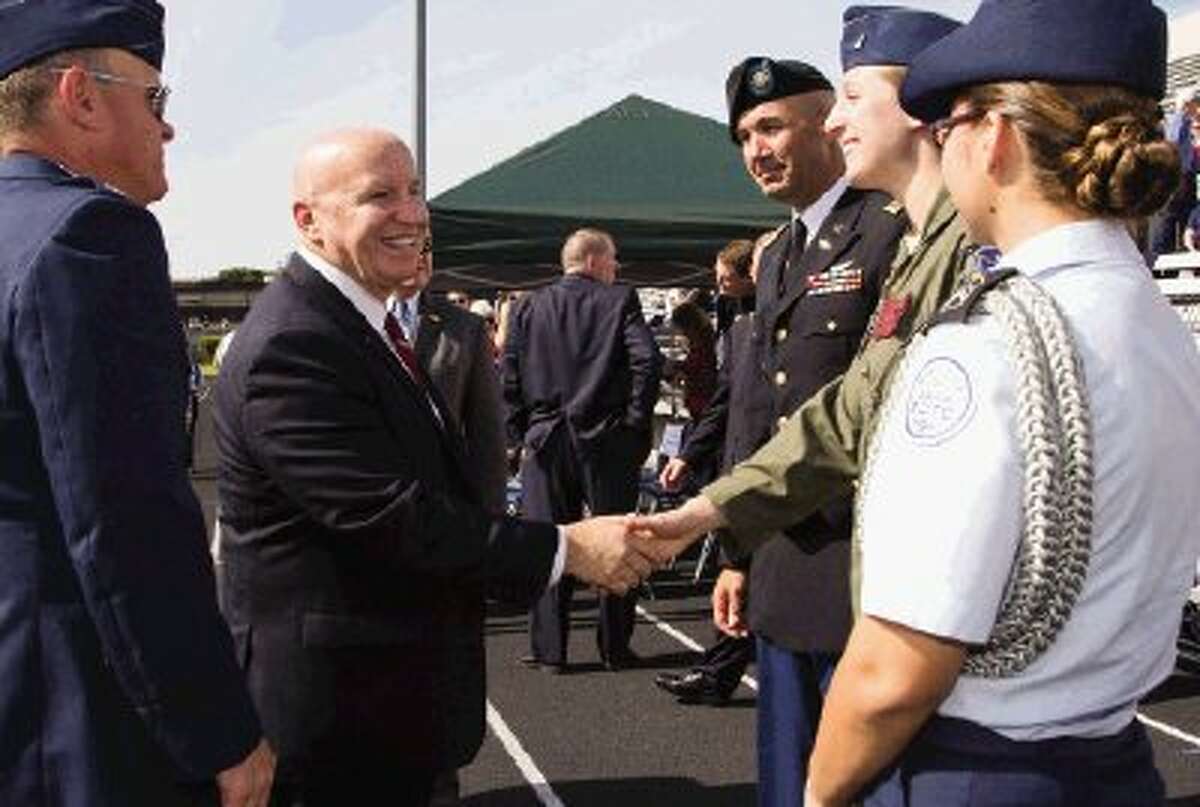 U.S. Congressman Kevin Brady thanks the event speakers during Salute to Our Veterans at Moorhead Stadium in Conroe. The event was for families, friends, veterans and students to celebrate Veterans Day on Monday. Go to HCNPics.com to view and purchase this photo, and others like it.