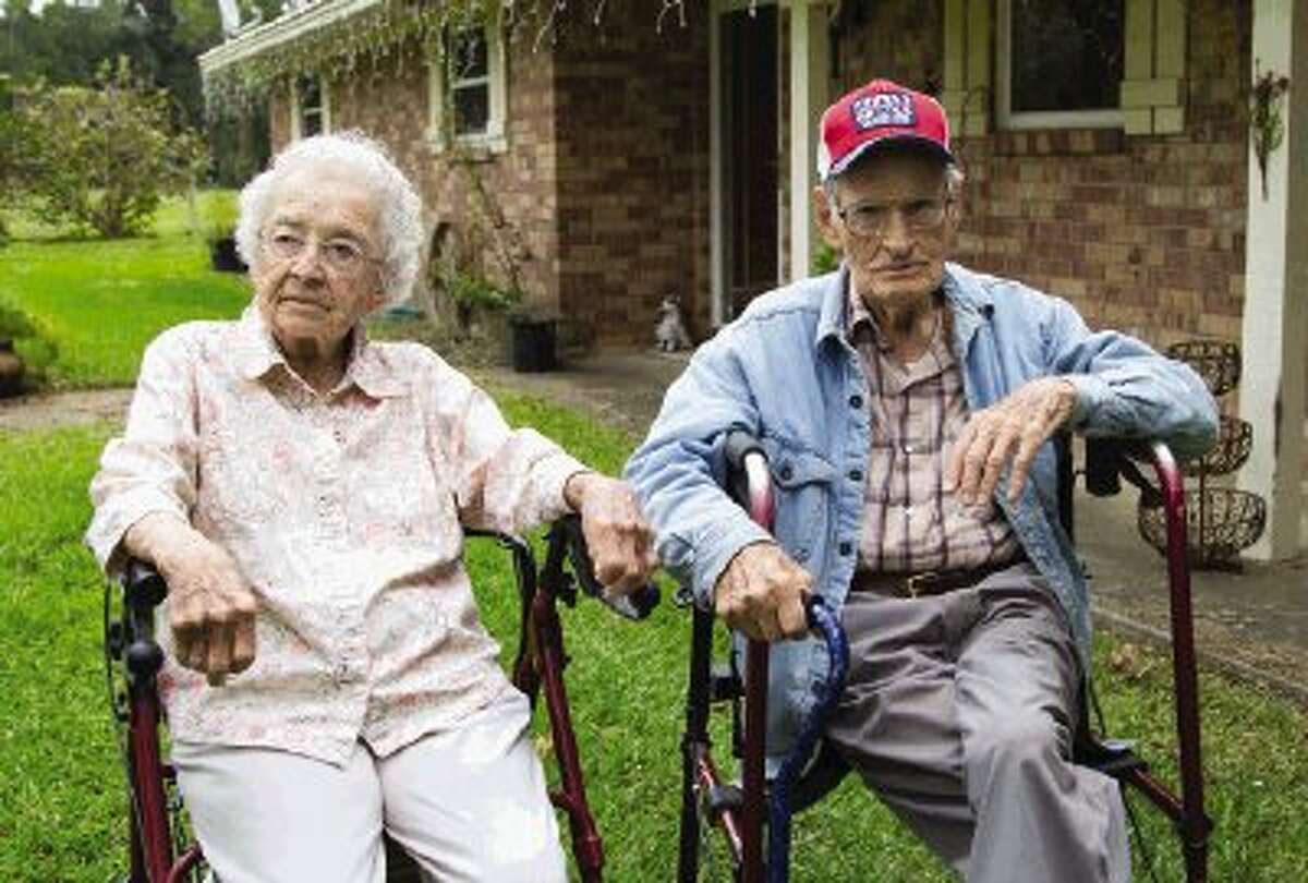 Mary Lou and Ralph Riggs sit in their front yard on a Tuesday afternoon in Willis. The Riggs celebrated their 80th anniversary on Monday, November 4.
