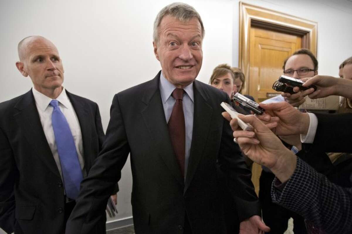 Senate Finance Committee Chairman Sen. Max Baucus, D-Mont. leaves his committee office on Capitol Hill in Washington, Tuesday, saying that he was going to speak to the news media in his home state of Montana before discussing his retirement from the Senate.