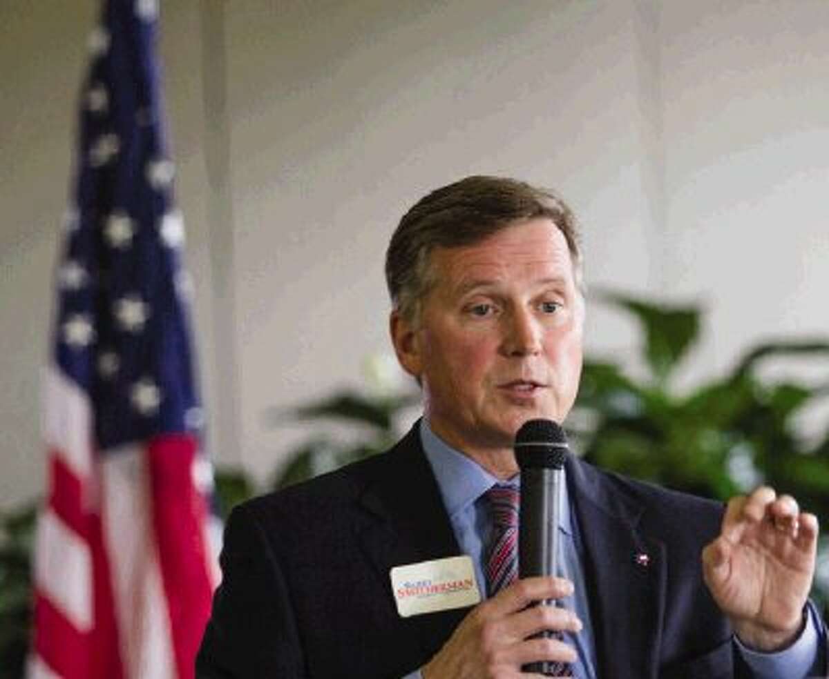 Texas Railroad Commissioner Barry Smitherman, who is a candidate for Texas attorney general, speaks to the North Shore Republican Women on Wednesday at Bentwater Country Club in Montgomery. Smitherman spoke on the Texas oil and gas industry and answered questions and concerns of the NSRW.