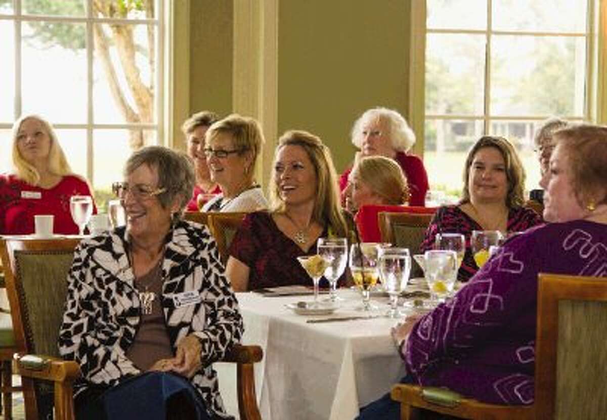 Members of the North Shore Republican Women laugh as Texas Railroad Commissioner Barry Smitherman, who is a candidate for Texas attorney general, makes a joke on Wednesday afternoon at Bentwater Country Club in Montgomery. Smithman answered questions and concerns of the NSRW.