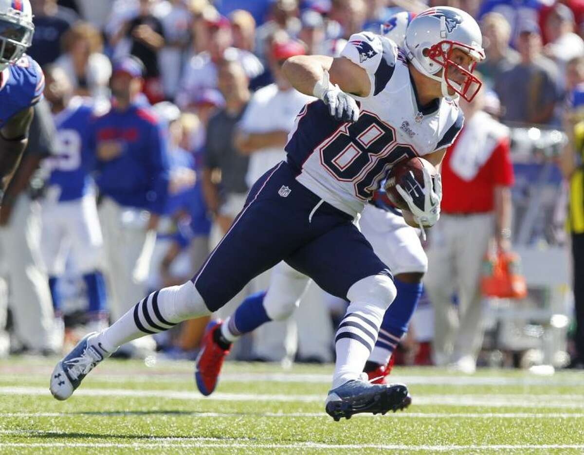 Patriots wide receiver Danny Amendola looks for yardage against the Bills. Amendola, who played high school football at The Woodlands, had 10 catches for 104 yards in the Patriots’ 23-21 victory.