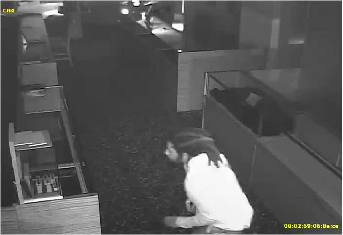 This surveillance video still shows a man believed to have broken into Thomas Markel Jewelry on Market Street in The Woodlands just before midnight Monday.