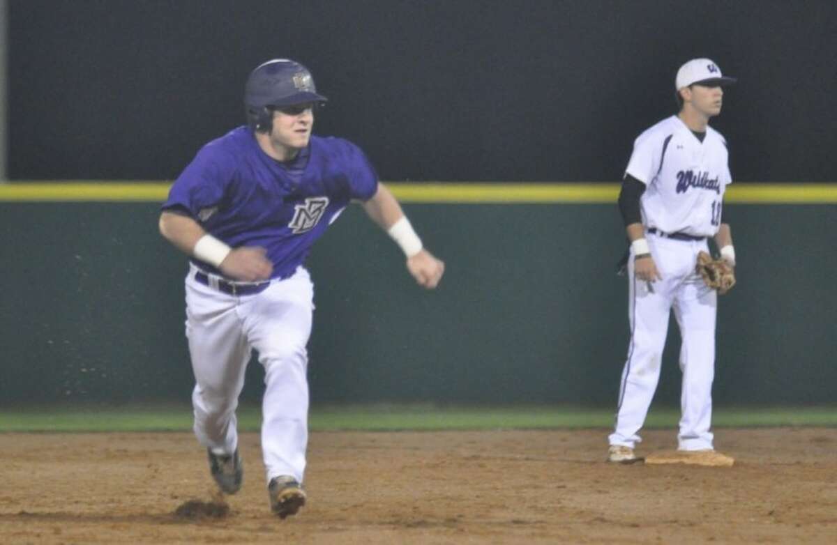 Montgomery's Jeffrey Elliot makes a dash for third base during a non-district game against Willis on Monday at the Willis athletic complex.