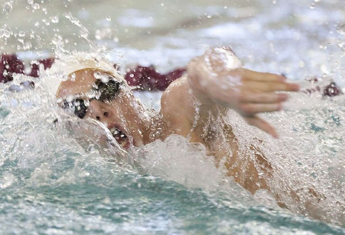 Magnolia West’s Brendan Costello competes in the 100-Yard Freestyle during the Region Swimming Championships Saturday at the Michael D. Holland Aquatic Center in Magnolia. See more photos online at www.yourconroenews.com/photos.