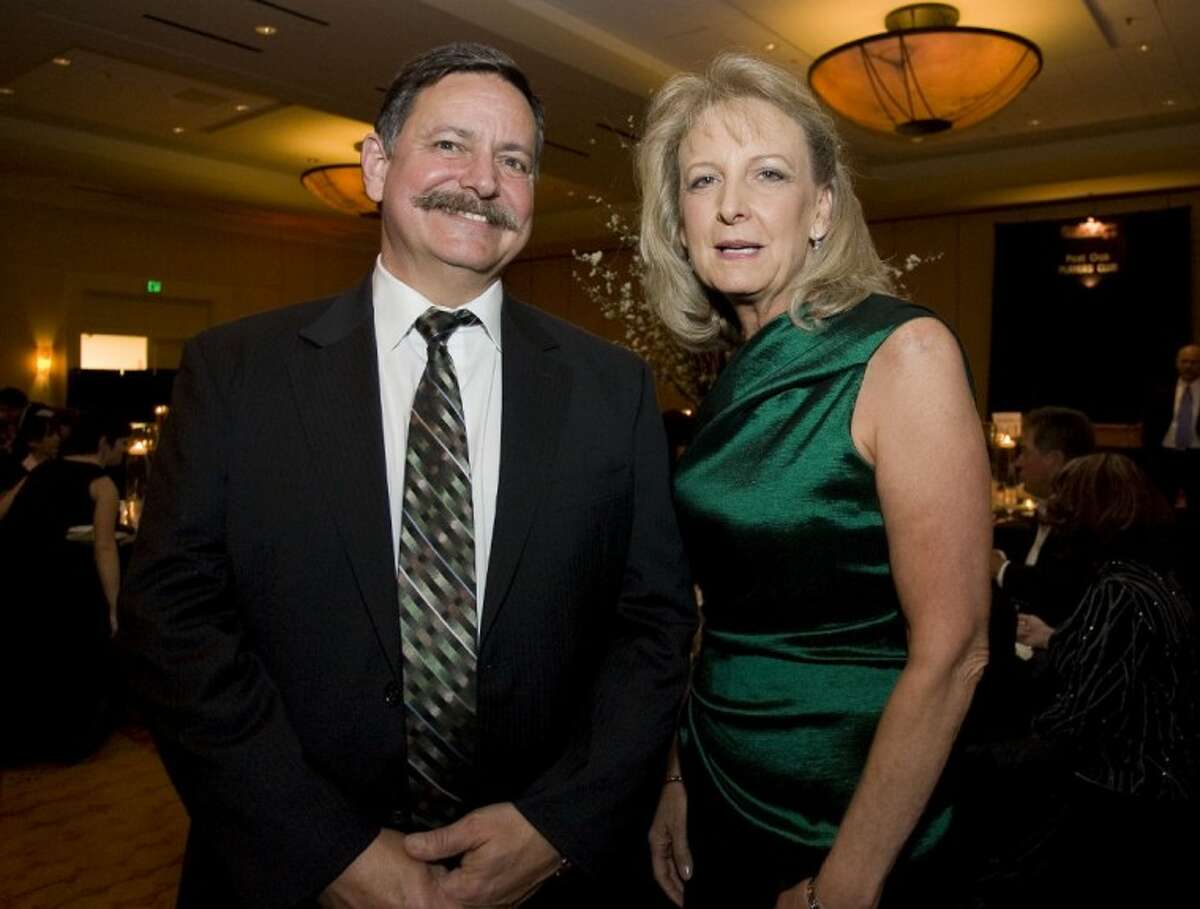 Outgoing Chairman Charlie Irvine, left, of Signs Etc., and Incoming Chairman Helen Thornton, of Thornton Financial Services, stand for a photograph during Saturday’s Greater Conroe/Lake Conroe Area Chamber of Commerce’s annual Chairman’s Ball at The Woodlands Waterway Marriott in The Woodlands.