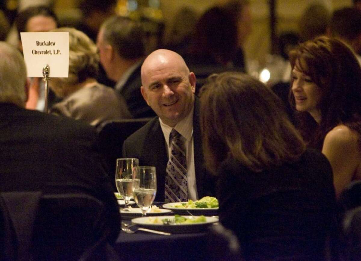 Conroe Police Chief Philip Dupuis enjoys a dinner during Saturday’s Greater Conroe/Lake Conroe Area Chamber of Commerce’s annual Chairman’s Ball at The Woodlands Waterway Marriott in The Woodlands.