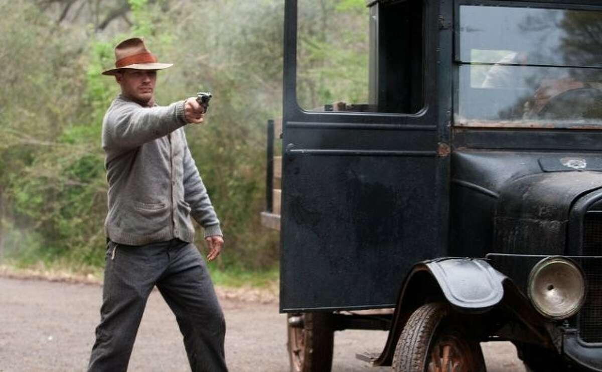 “Lawless” is set in the world of illegal bootlegging in Prohibition-era Franklin County, Virginia. It features three brothers (LaBeouf, Hardy and Jason Clarke) who run a successful still, and are on top of the world until a corrupt official (Pearce) attempts to try to take his share of their earnings.