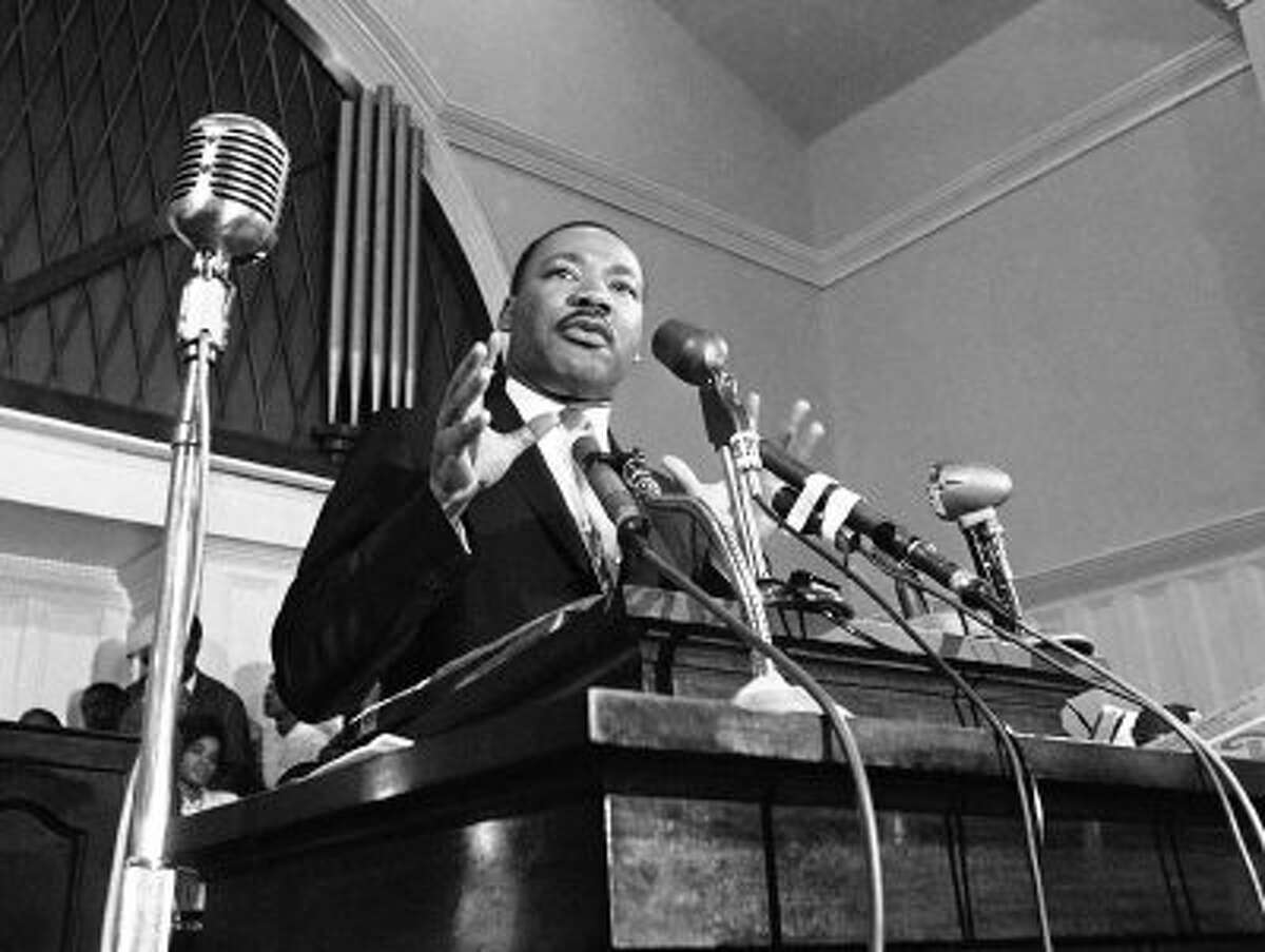 In this 1960 file photo, Martin Luther King Jr. speaks in Atlanta.