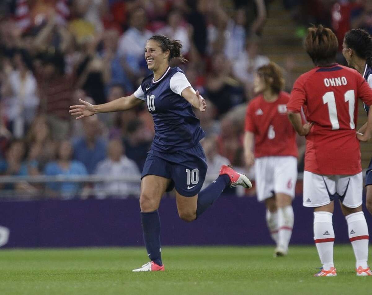 The United States’ Carli Lloyd celebrates one of her goals during the women’s soccer gold medal match Thursday at the Summer Olympics in London.