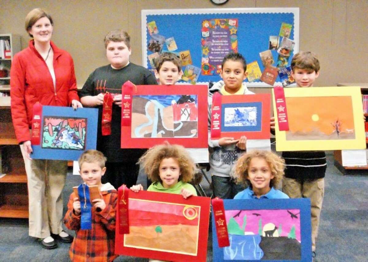 Glen Loch Elementary Rodeo Art Show participants proudly display their winning art work.