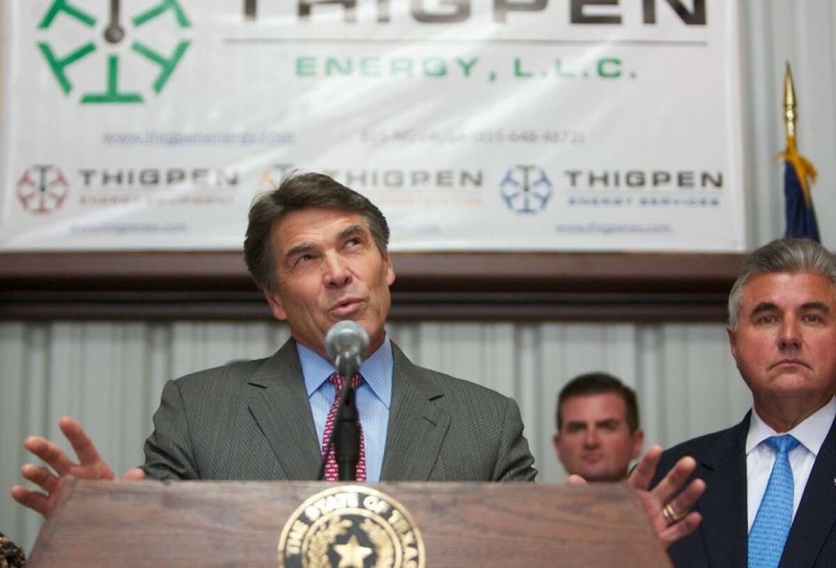 Texas Gov. Rick Perry addresses the media Wednesday at Thigpen Energy company in Cut and Shoot. Perry spoke regarding proposed reforms to welfare and unemployment insurance programs.