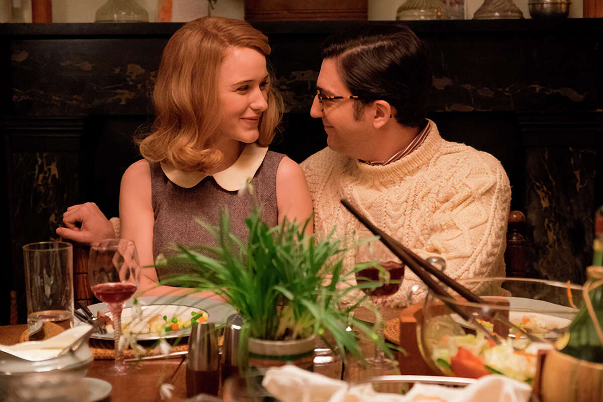 In Woody Allen’s first TV project, he plays a husband with no kids but a parental interest in their friends’ son (John Magaro, right), who is engaged to a straitlaced Rachel Brosnahan.