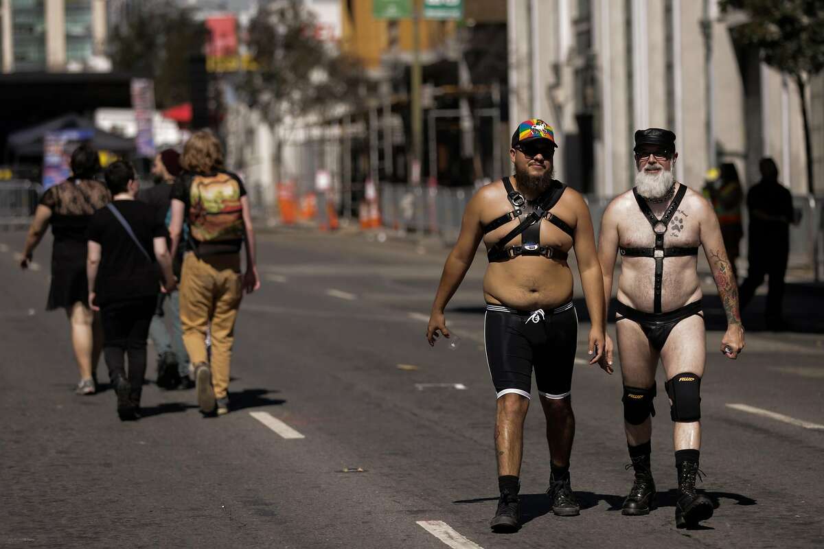 In this file photo, people dressed in costume walk through the Folsom Street Fair in San Francisco, California, on Sunday, Sept. 25, 2016.