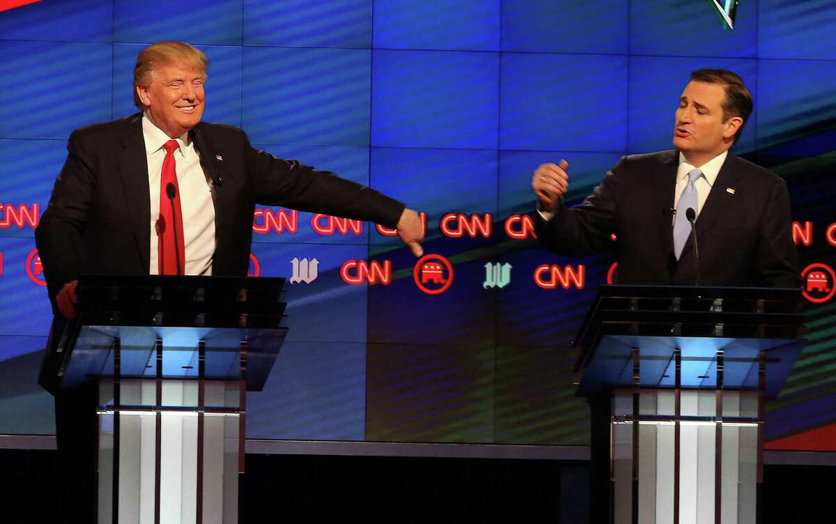 Donald Trump, left, and Sen. Ted Cruz engaged in a brisk and lively exchange during the GOP presidential primary season. Cruz is now stumping for Trump and Senate candidates around the country, even if he won't say the GOP nominee's name. They haven't appeared together on the campaign trail.