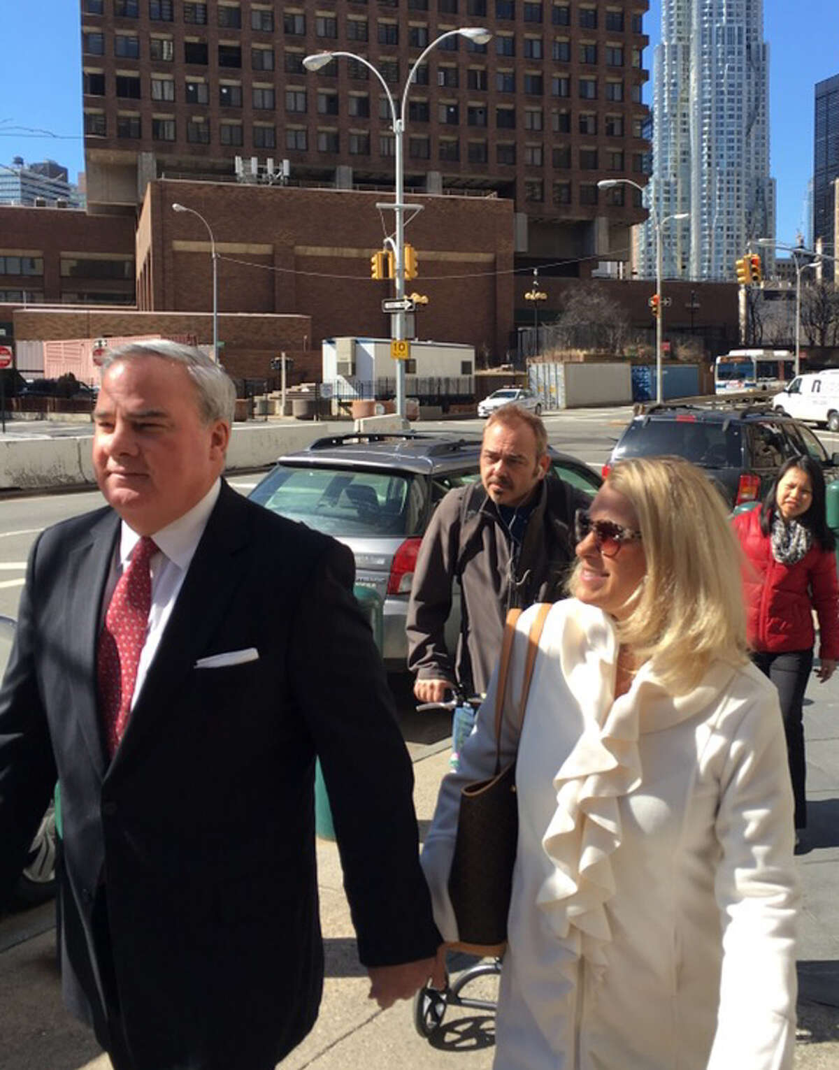 Former Connecticut Gov. John Rowland with his wife Patricia last March outside a federal appeals court in New York. Rowland lost that appeal and dropped a follow-up appeal to the United States Supreme. He reported Monday to a federal prison in New York state, retaining his earlier ID number: 15623-014.