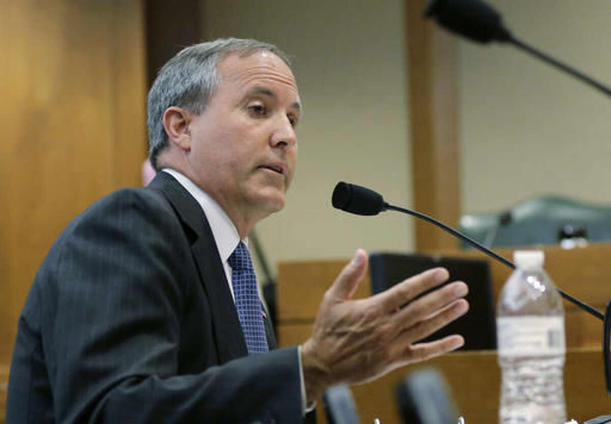 FILE - In this July 29, 2015, file photo, Texas Attorney General Ken Paxton speaks during a hearing in Austin, Texas. Paxton, who is under indictment on felony charges of duping investors in a tech startup, accepted $100,000 for his criminal defense from the head of a radiology provider while his office investigated the company for Medicaid fraud. (AP Photo/Eric Gay, File)