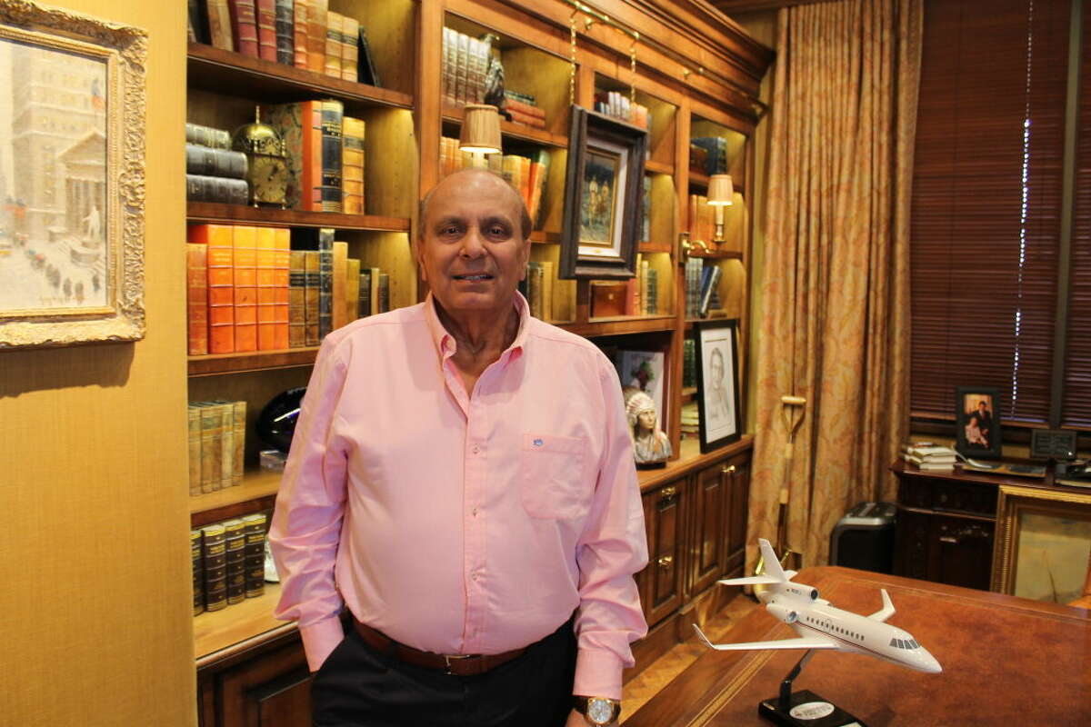 S. Javaid Anwar stands in his office before he receives his Hope Award by the MS Society at the annual Dinner of Champions. 