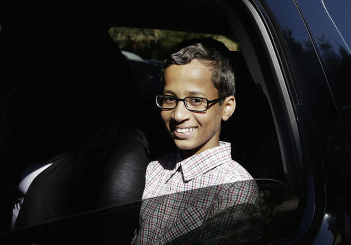 FILE - In this Sept. 17, 2015 file photo, Ahmed Mohamed sits in a vehicle before leaving his family's home in Irving, Texas. The family of Ahmed Mohamed, who was arrested after a homemade clock he brought to school was mistaken for a bomb, filed a lawsuit Monday, Aug. 8, 2016, against Texas school officials saying they violated the boy's civil rights. (AP Photo/LM Otero, File)