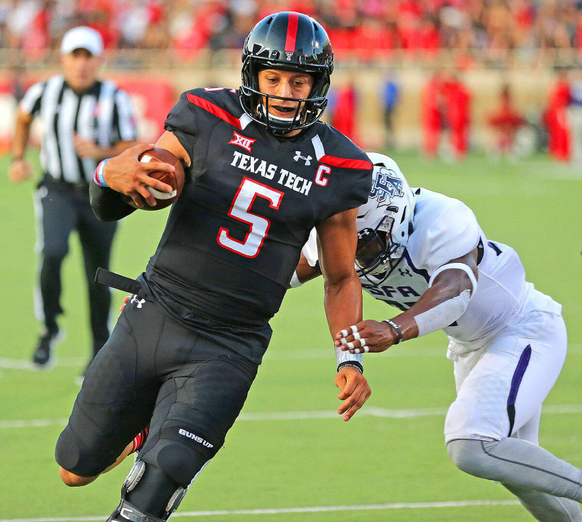   Texas Tech quarterback Patrick Mahomes II scampers into the end zone for a Red Raider score against Stephen F. Austin, Saturday, Sept. 3 at Jones AT&T Stadium.