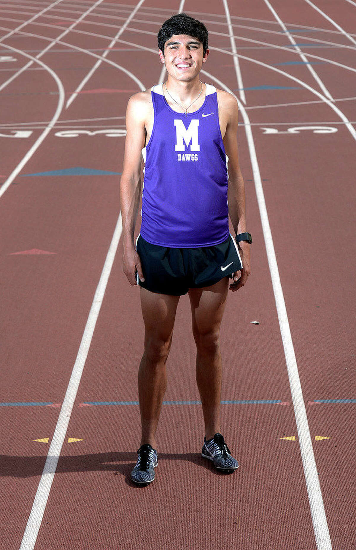 Midland High distance runner Bryce Hoppel, a qualifier for the UIL Class 6A State Track and Field Championships, in portrait at Memorial Stadium. James Durbin/Reporter-Tele­gram