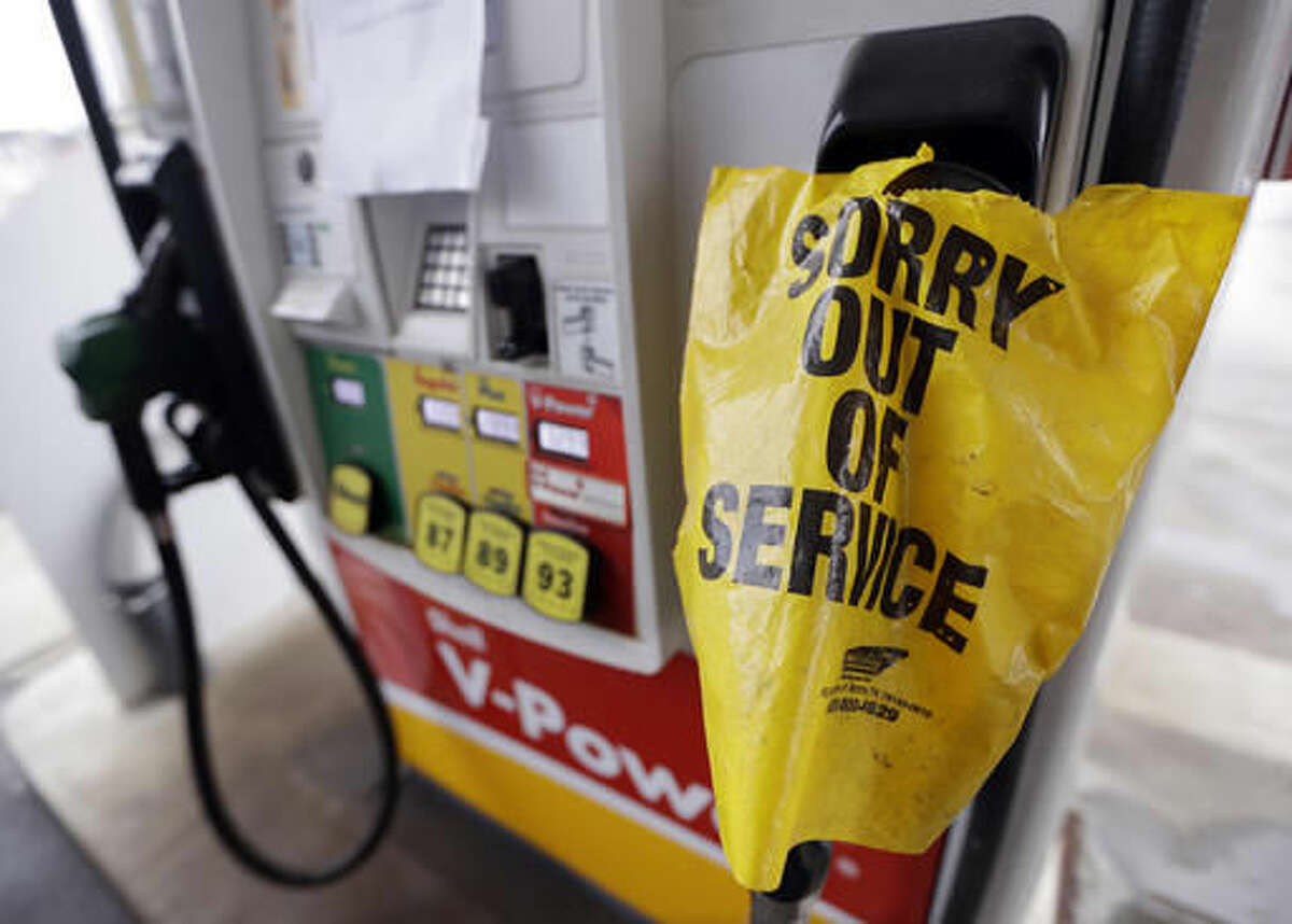 A bag covers a pump handle at a gas station that has no fuel to sell Saturday, Sept. 17, 2016, in Nashville, Tenn. Fuel supplies in at least five states are threatened by a gasoline pipeline spill in Alabama, and the U.S. Department of Transportation has ordered the company responsible to take corrective action before the fuel starts flowing again. (AP Photo/Mark Humphrey)
