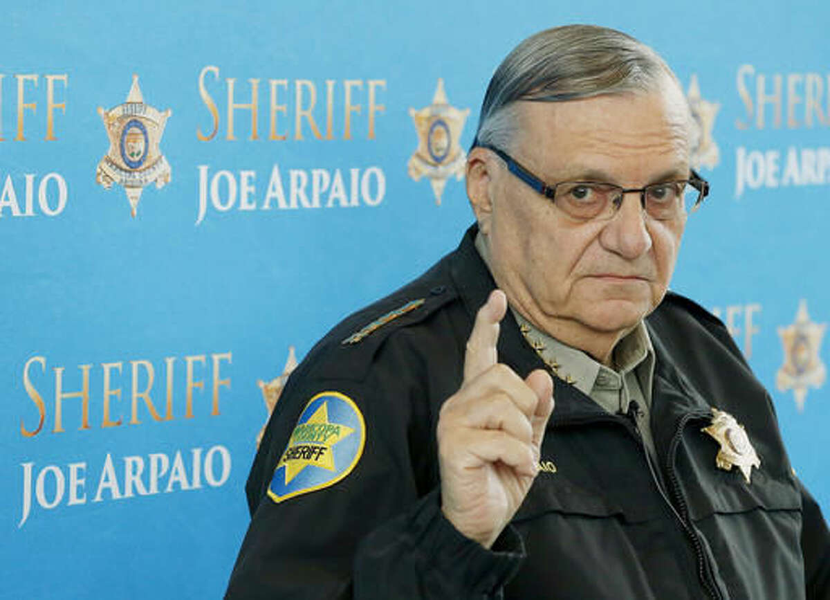 FILE - In this Dec. 18, 2013, file photo, Maricopa County Sheriff Joe Arpaio speaks at a news conference at the Sheriff's headquarters in Phoenix. A judge has found the longtime sheriff of metro Phoenix in contempt of court Friday for disobeying his orders in a racial profiling case, bringing the lawman who calls himself "America's Toughest Sheriff" a step closer to a possible criminal contempt case that could expose him to fines and even jail time. (AP Photo/Ross D. Franklin, File)