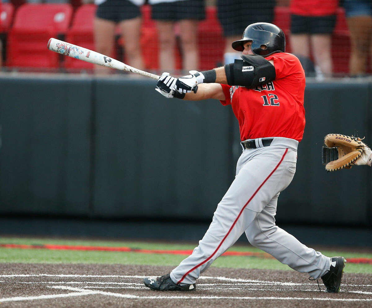 Texas Tech's Eric Gutierrez hits a game-clinching two-run single during an NCAA college baseball tournament super regional game against East Carolina, Saturday in Lubbock, Texas. (Brad Tollefson/Lubbock Avalanche-Journal via AP)