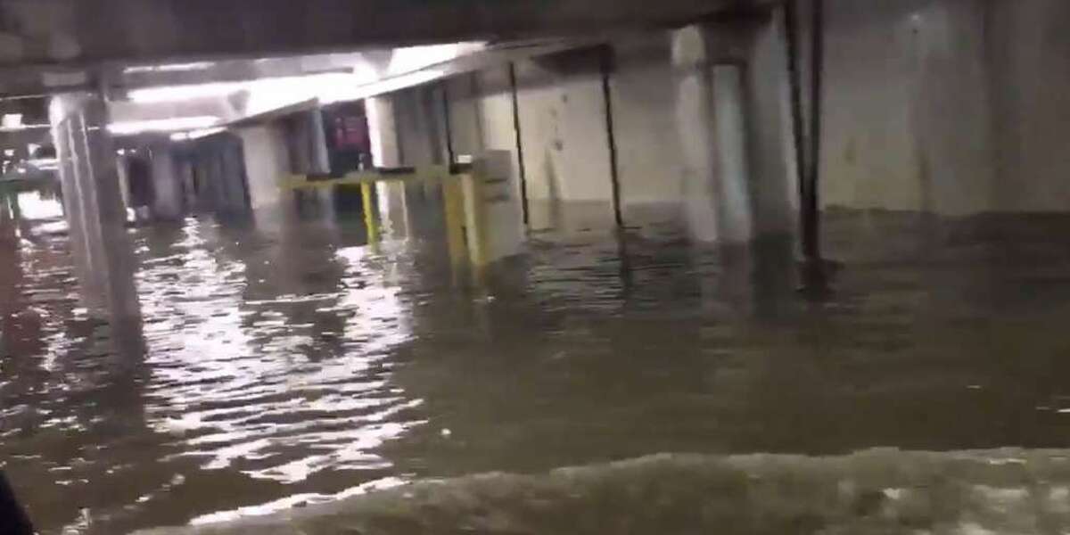 Storms flooded the Houston Galleria parking garage on Sunday as storms swept across the region. Photo via Leslie on Twitter