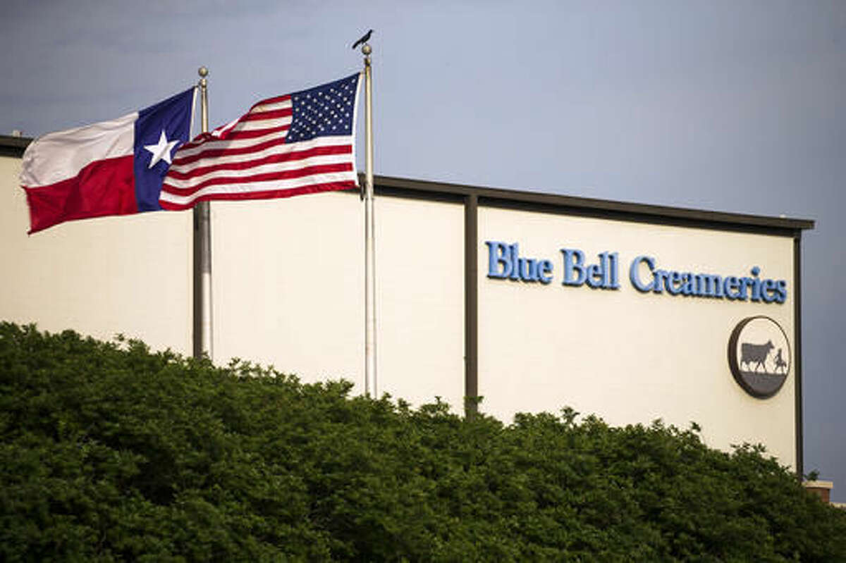 FILE - In thus April 23, 2015 file photo, flags flutter in the breeze outside of the Blue Bell Creameries in Brenham, Texas. A supplier of cookie dough that Blue Bell Creameries is blaming for a possible listeria contamination of some of its ice cream products says its product tested negative for the pathogen before being sent to the Texas-based company. In a statement Thursday, Sept. 22, 2016, Iowa-based Aspen Hills said the "positive listeria results were obtained by Blue Bell only after our product had been in their control for almost two months." (Smiley N. Pool/The Dallas Morning News via AP, File)
